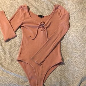 Blush pink body suit